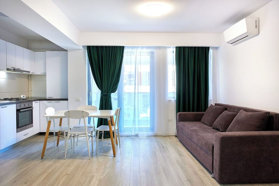 Family Apartment | Living area | 110-cm TV with cable channels