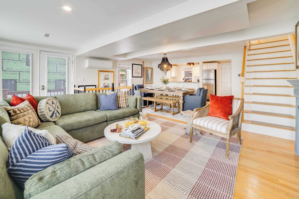 Experience the warmth and openness of the space with an inviting open floor plan, where the dining and living areas flow seamlessly together. 