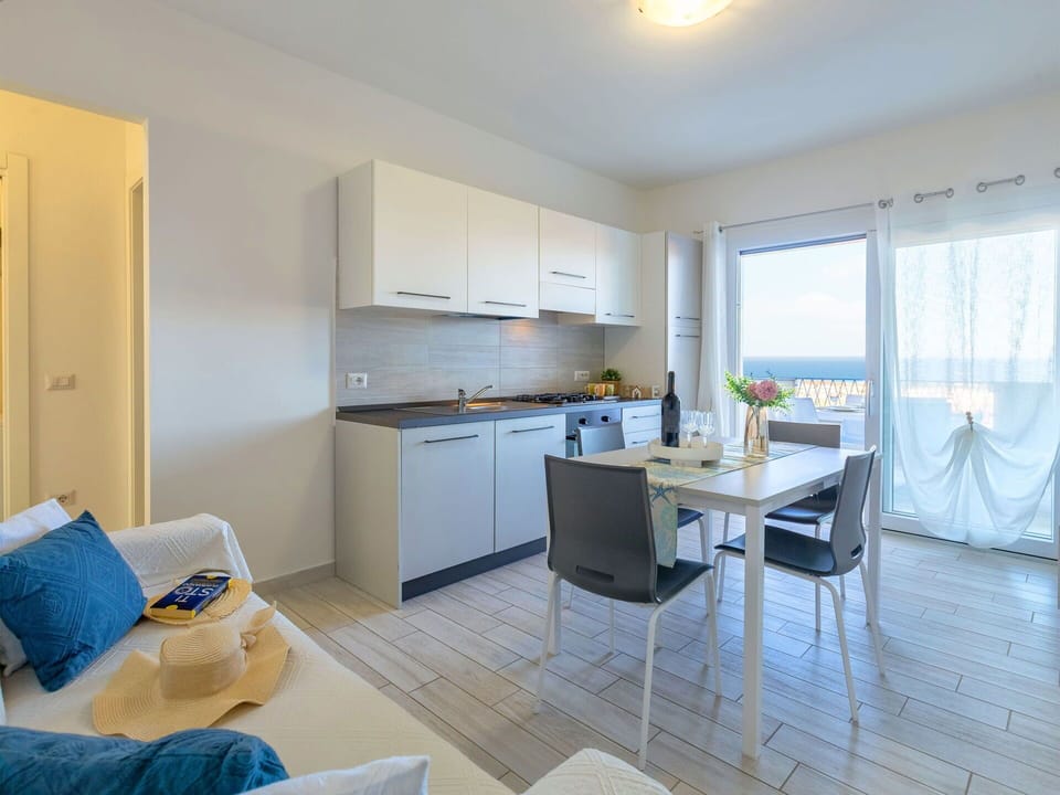 Furniture, Interior Design, Flooring, Wood, Floor, Table, Chair, Apartment, Ceiling, Room