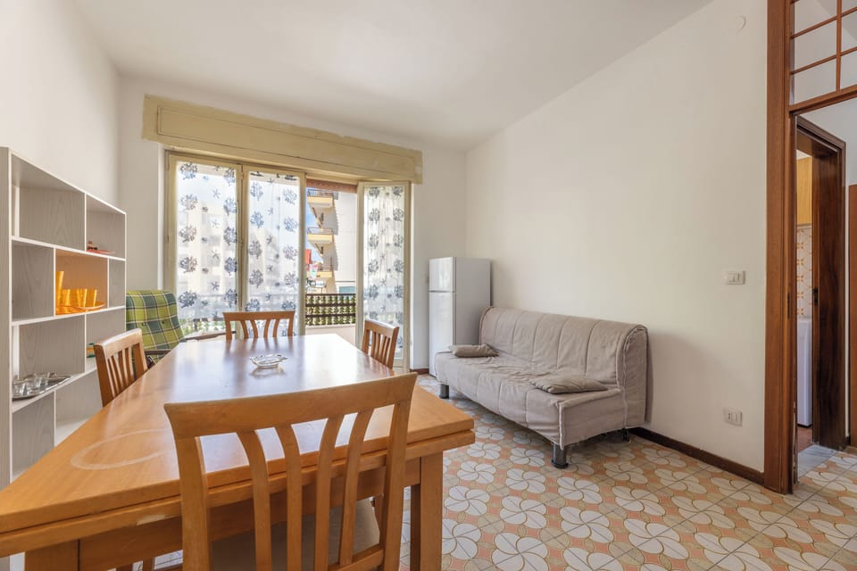 Apartment, Balcony, City View | Living area | 32-inch flat-screen TV with cable channels