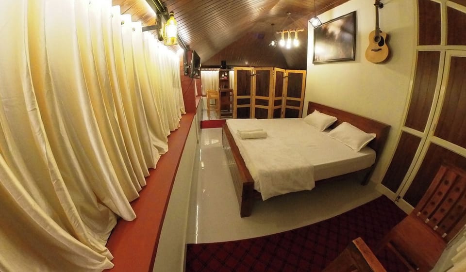 Family Suite, River View | Laptop workspace, iron/ironing board, free WiFi