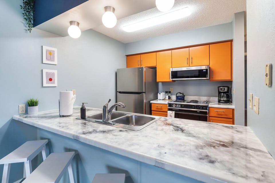 Just like home, our kitchen is stocked with pots, pans, dishes and utensils!