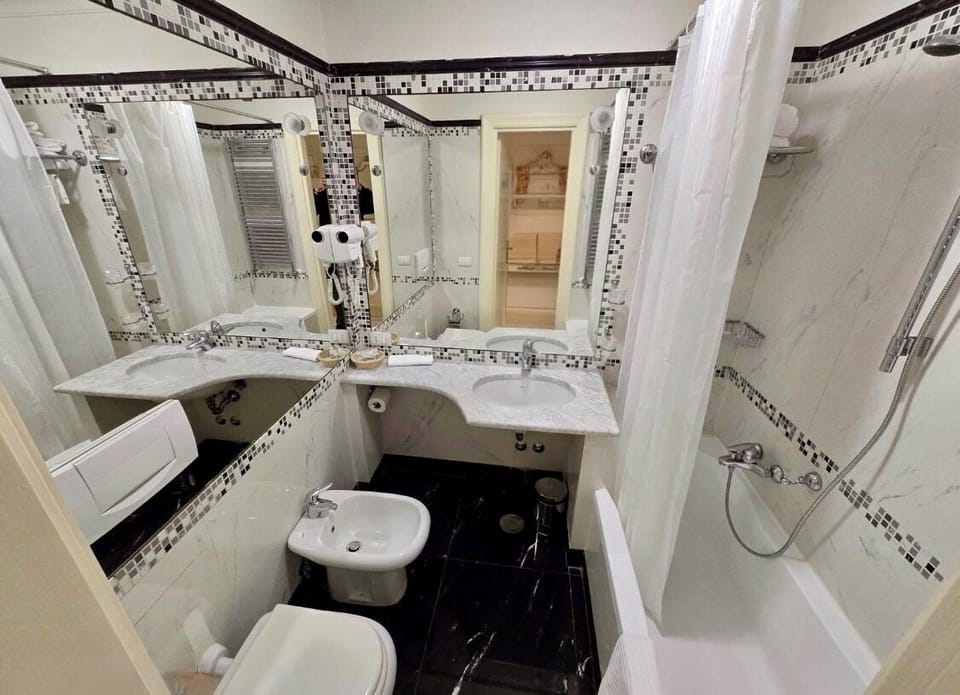 Free toiletries, hair dryer, bidet, towels