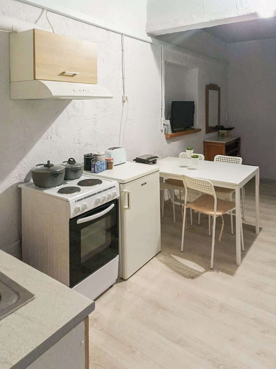 Open-plan space, complete with a smart TV