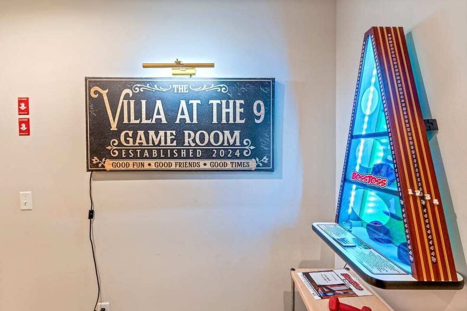 Game room with bunk bed, 6 commercial-grade arcade games, wet bar, and Xbox