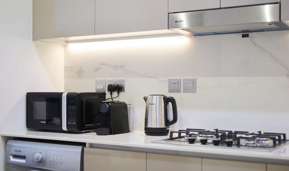 Comfort Apartment, City View | Private kitchen