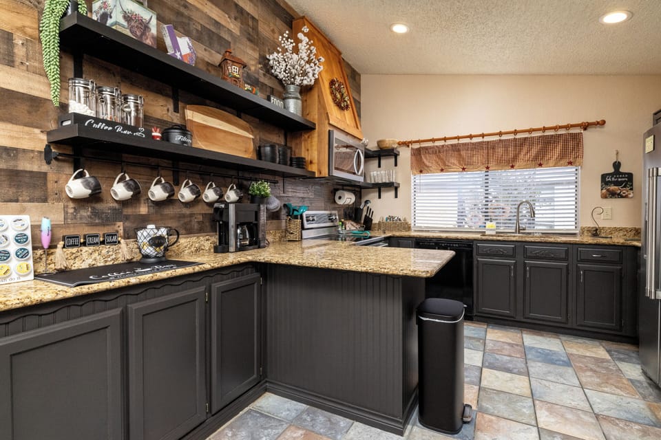 Fully stocked kitchen with coffee bar and cooking essentials
