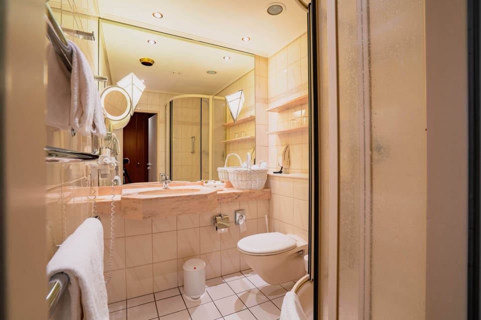 Hair dryer, slippers, towels, soap