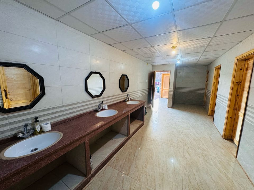 Shower, rainfall showerhead, towels