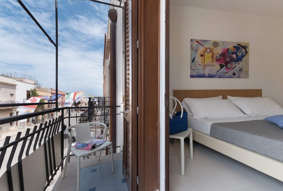 Basic Triple Room, Balcony | In-room safe, desk, blackout drapes, iron/ironing board