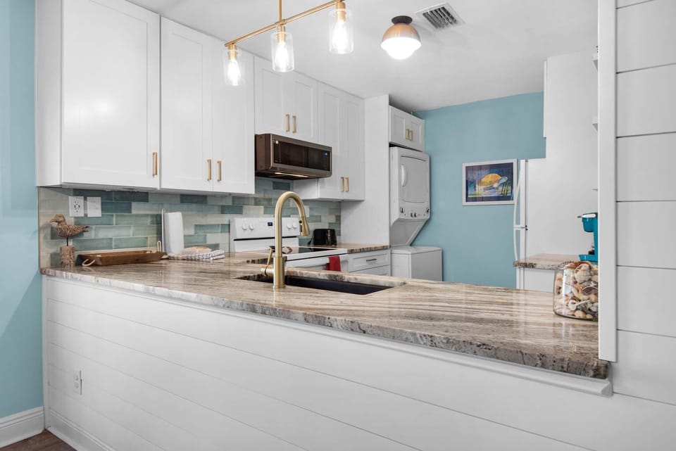 Condo, Multiple Beds (Beachview 102 - Flaming Sunrise) | Private kitchen | Oven, toaster
