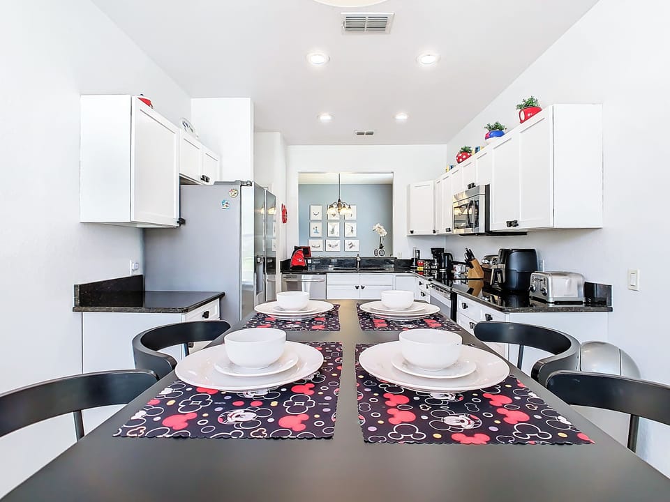 The breakfast nook in the kitchen seats 4.