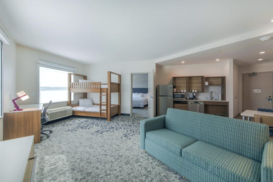 Suite, 1 Bedroom | Living area | 70-inch LED TV with satellite channels, Netflix, streaming services
