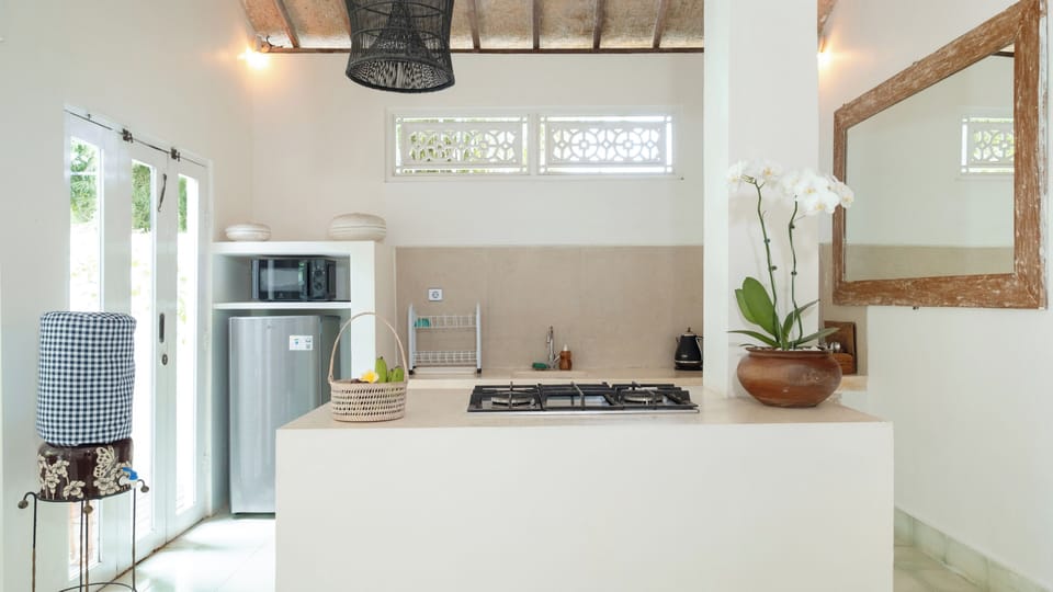 Villa, Garden View | Private kitchen | Dining tables