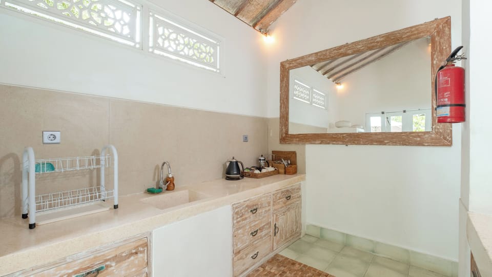 Villa, Garden View | Private kitchen | Dining tables