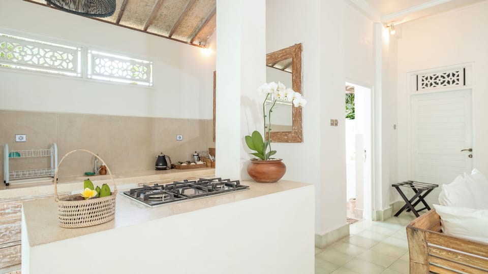 Villa, Garden View | Private kitchen | Dining tables