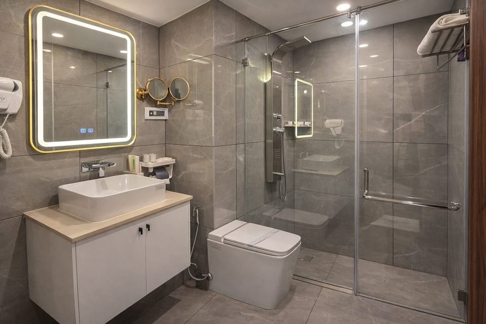 Shower, hair dryer, slippers, towels