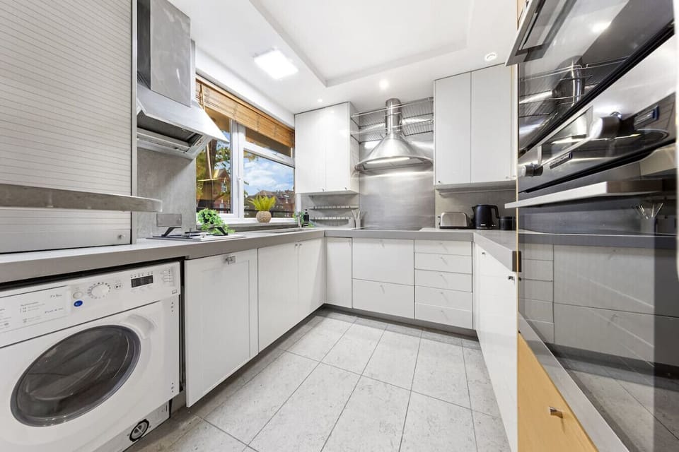 A stylish, well-appointed kitchen perfect for preparing delicious meals.