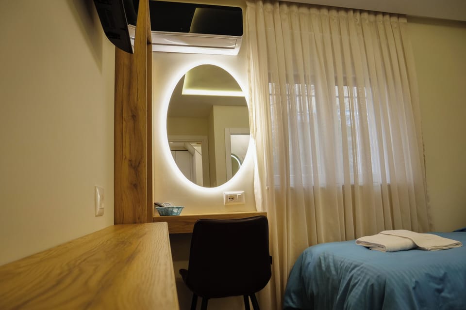Standard Double or Twin Room | Desk, laptop workspace, blackout drapes, soundproofing
