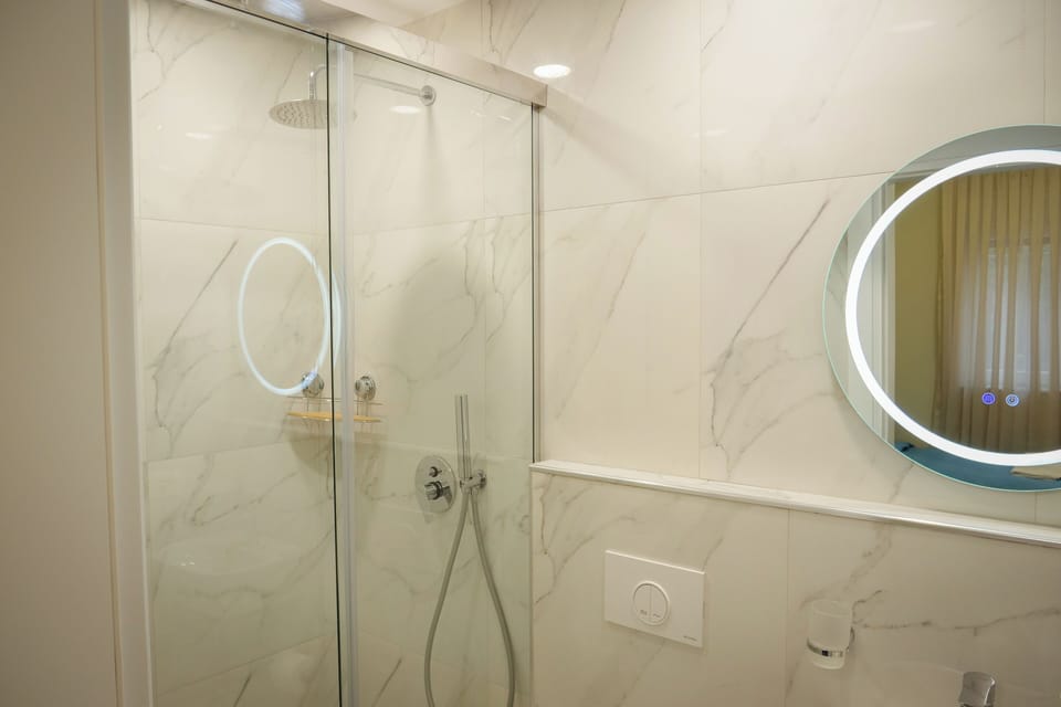 Standard Double Room | Bathroom | Shower, hair dryer, slippers, bidet