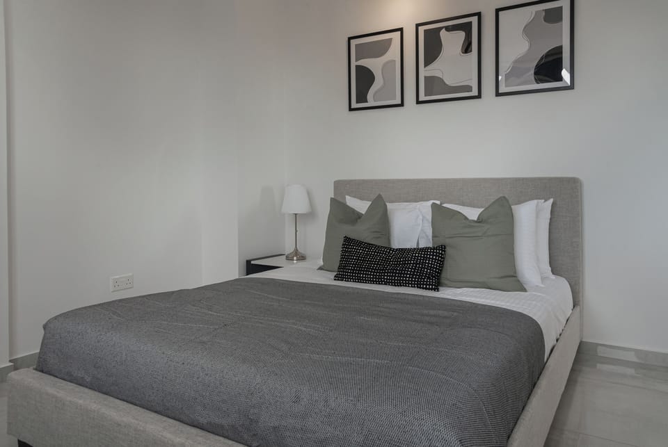 Luxury Apartment, Sea View | 2 bedrooms, in-room safe, blackout drapes, iron/ironing board