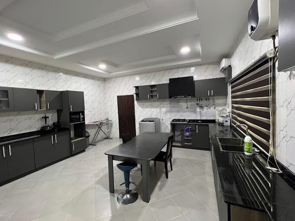Economy Apartment, Balcony, City View | Private kitchen | Fridge, microwave, oven, stovetop