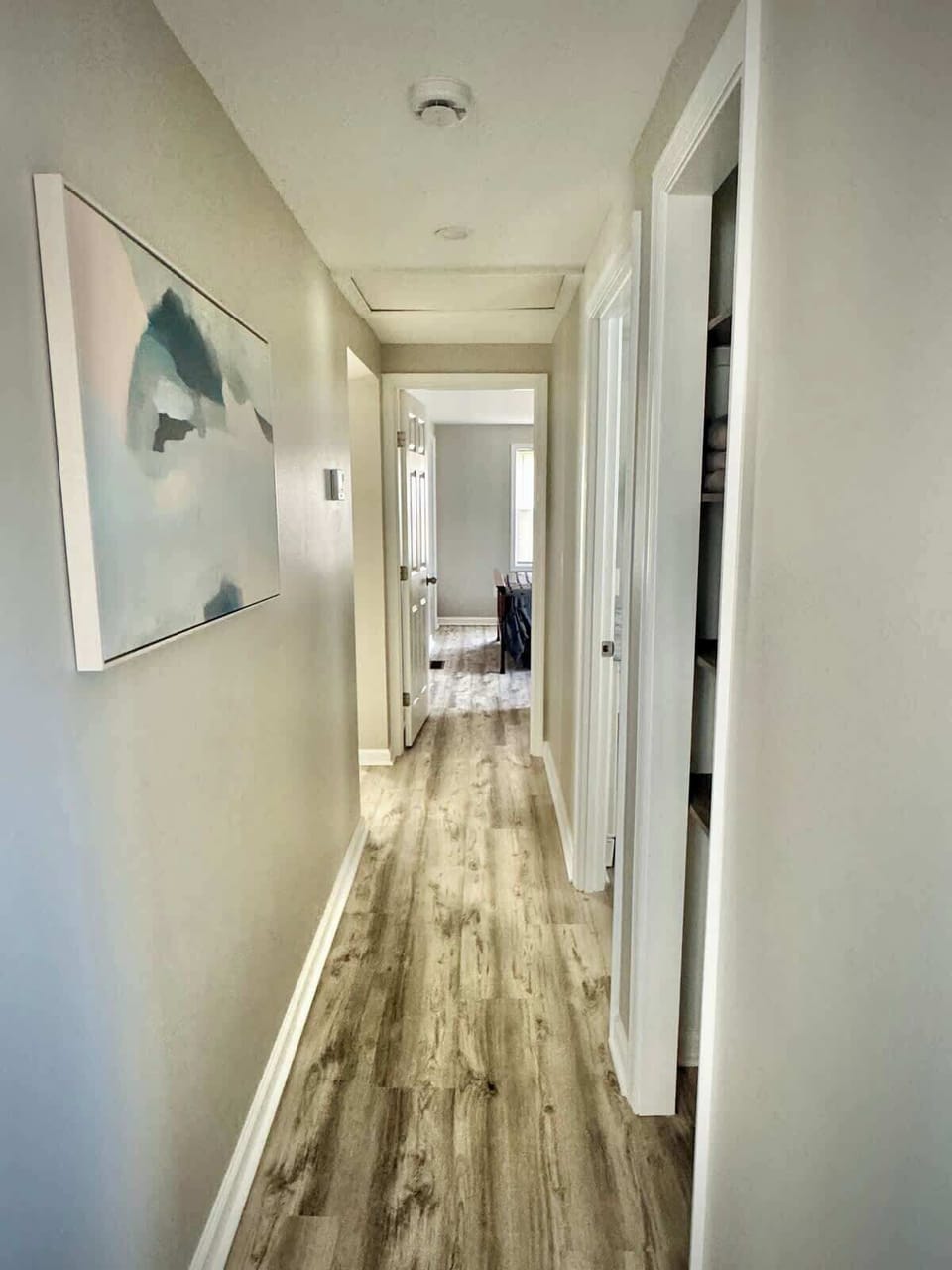Bright hallway leading to your comfortable sleeping spaces