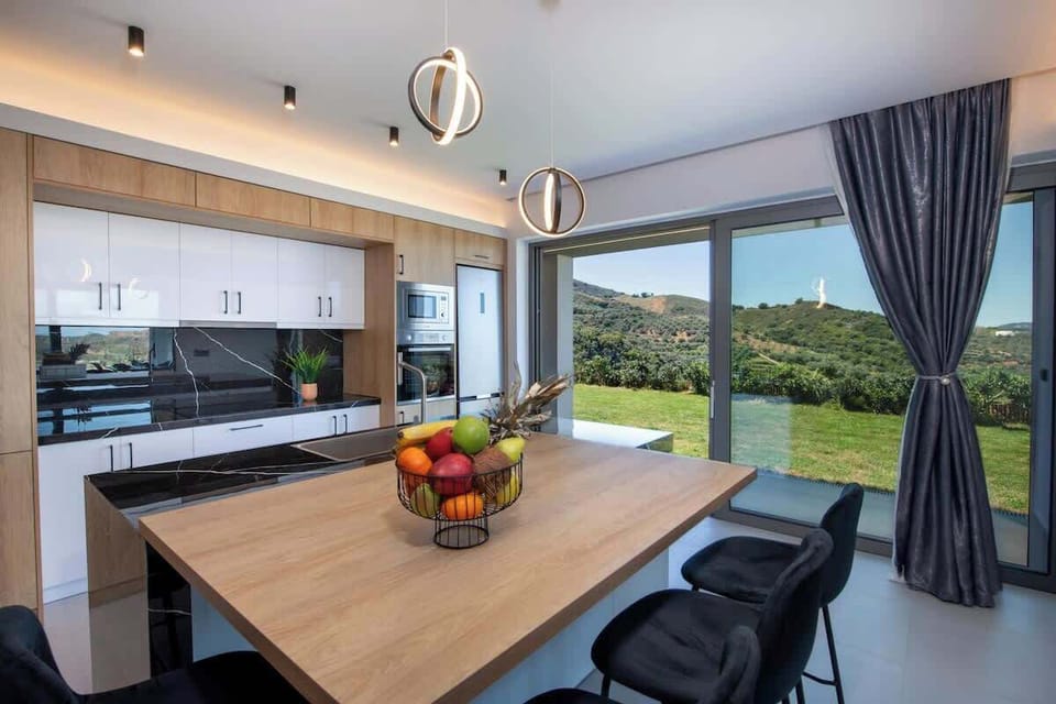 Modern Kitchen with Complete Amenities & Dining Space