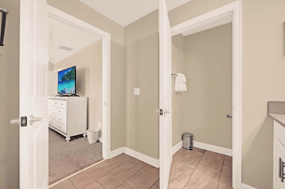 Convenient access to a cozy bedroom and private bathroom for a comfortable stay.