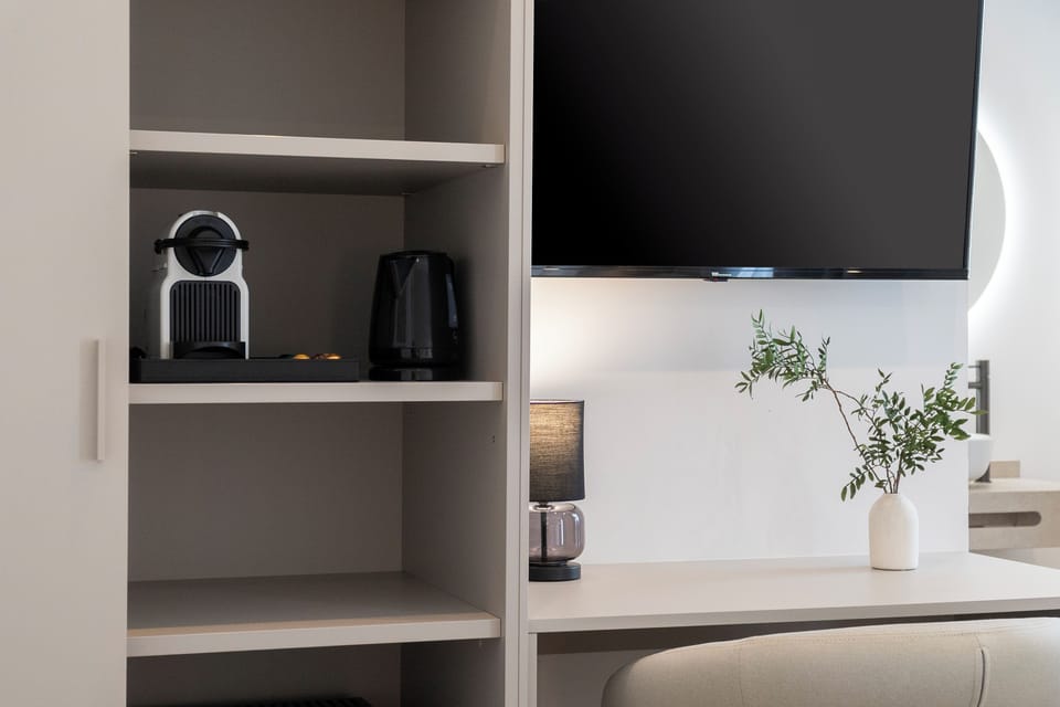 Deluxe Room, Balcony, City View | In-room safe, desk, laptop workspace, soundproofing