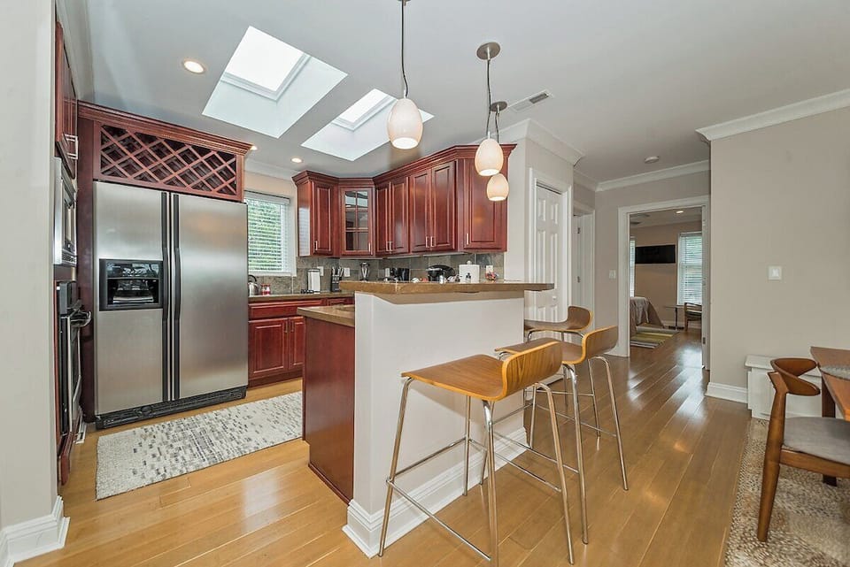 Stainless Kitchen with Granite Counter Bar