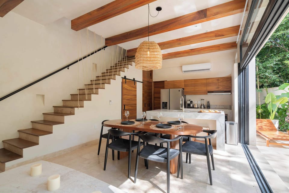Incredible open-plan kitchen and dining area with a connection to the outdoor patio