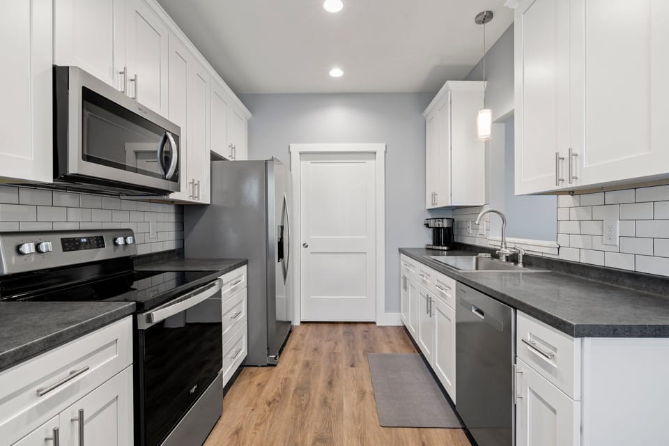Fully equipped kitchen for preparing meals.