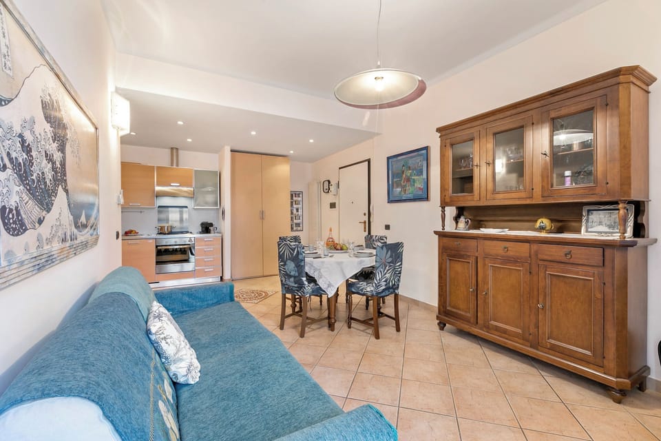 Family Apartment, Multiple Bedrooms (Domus 21 Near Alassio Beach) | Living area | 21-inch flat-screen TV with satellite channels
