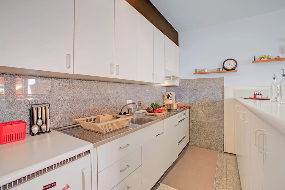 Family Apartment, 1 Bedroom, Terrace, Mountainside (Casa Tecitt with Shared Pool in Val) | Private kitchen | Coffee/tea maker, electric kettle