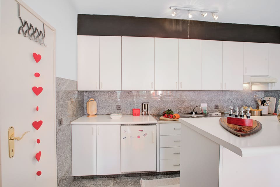 Family Apartment, 1 Bedroom, Terrace, Mountainside (Casa Tecitt with Shared Pool in Val) | Private kitchen | Coffee/tea maker, electric kettle