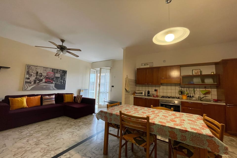 Family Apartment, Multiple Bedrooms, Mountainside (La Pietra sul Mare) | Living area | 21-inch flat-screen TV with satellite channels