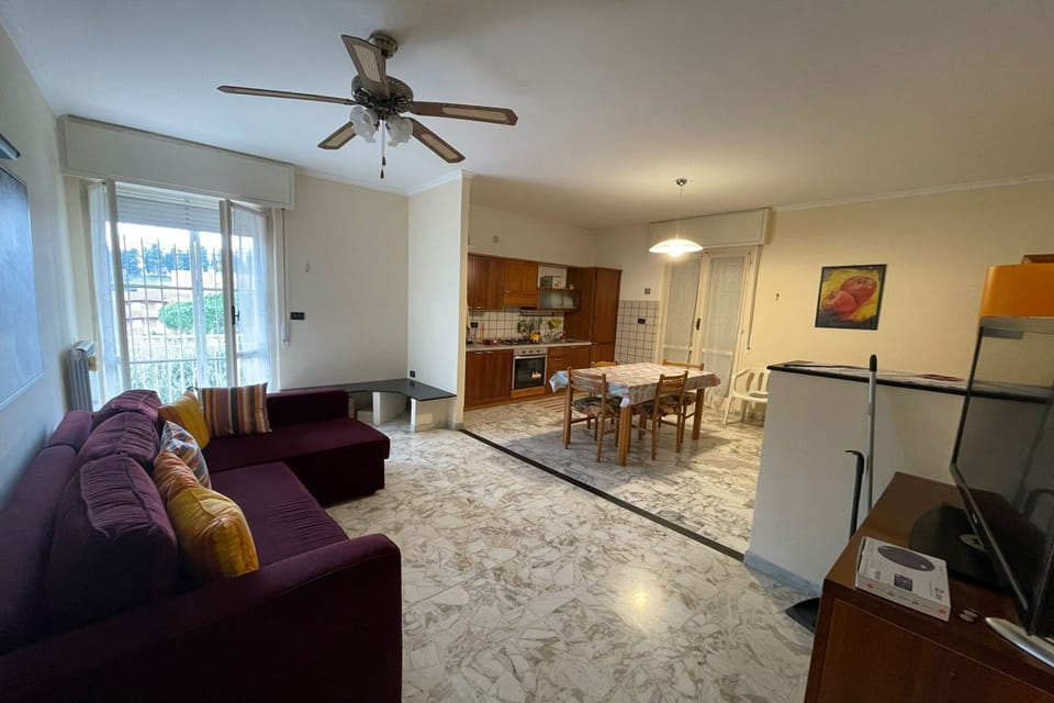 Family Apartment, Multiple Bedrooms, Mountainside (La Pietra sul Mare) | Living area | 21-inch flat-screen TV with satellite channels