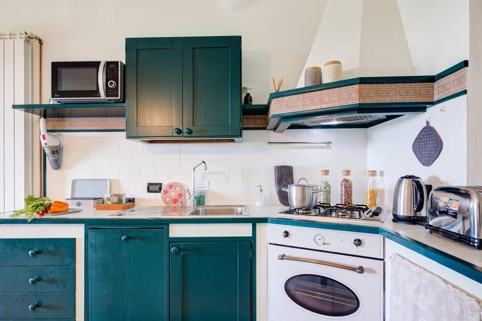 Family Apartment, 2 Bedrooms, Microwave, Mountainside (Lakeview Bliss / pool & fenced Garden) | Private kitchenette | Dishwasher
