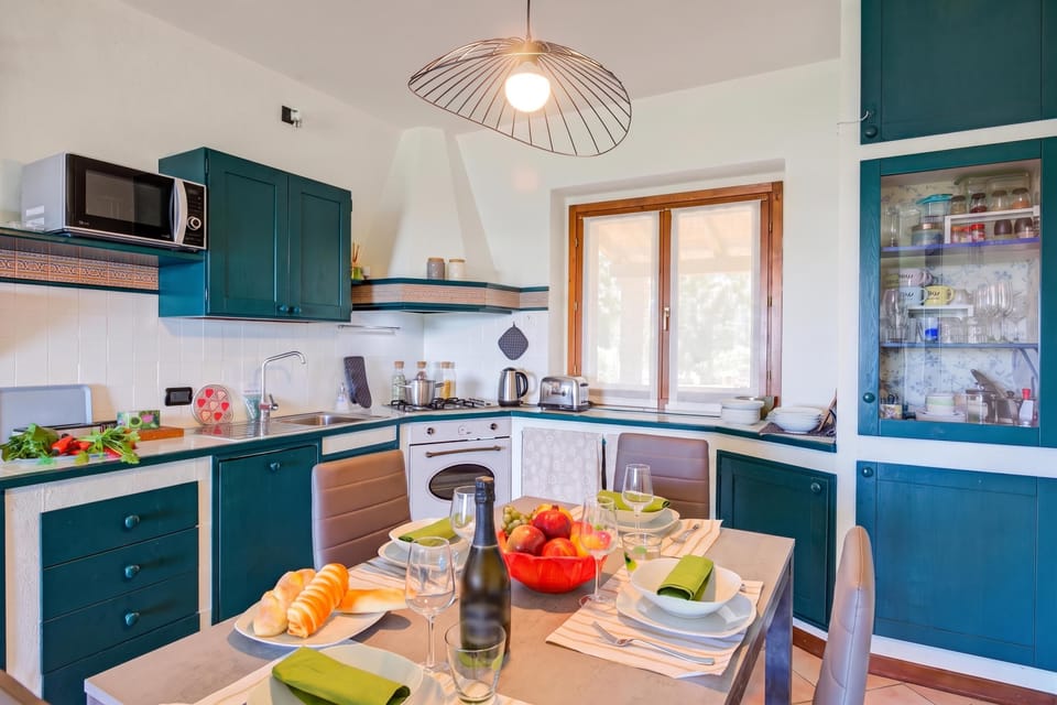 Family Apartment, 2 Bedrooms, Microwave, Mountainside (Lakeview Bliss / pool & fenced Garden) | Private kitchen | Dishwasher
