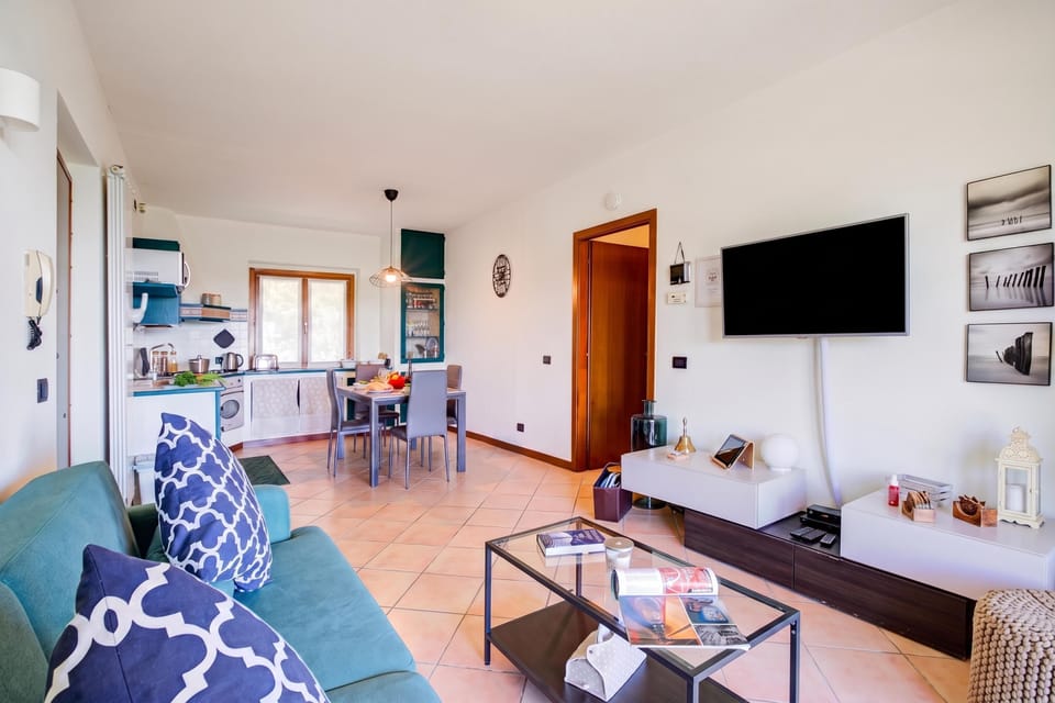 Family Apartment, 2 Bedrooms, Microwave, Mountainside (Lakeview Bliss / pool & fenced Garden) | Living area | Smart TV