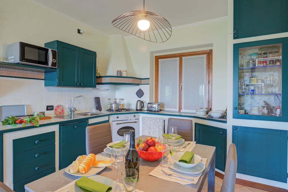Family Apartment, Multiple Bedrooms, Mountainside (Lakeview Bliss / pool & fenced Garden) | Private kitchenette | Fridge, microwave, oven, stovetop