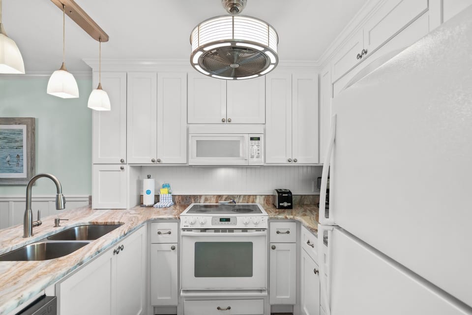 Townhome, Multiple Beds, Patio, Garden View (30 Chateau Rd | SeaRenity) | Private kitchen | Fridge, microwave, oven, stovetop