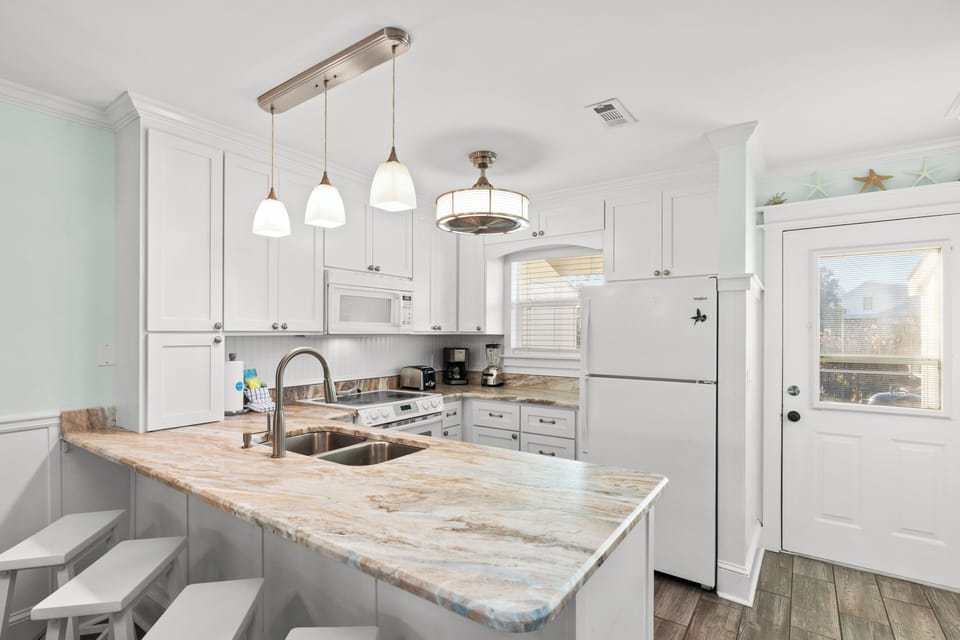 Townhome, Multiple Beds, Patio, Garden View (30 Chateau Rd | SeaRenity) | Private kitchen | Fridge, microwave, oven, stovetop