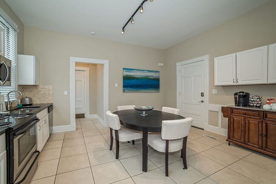 Kitchen with Dining Table and Breakfast Bar