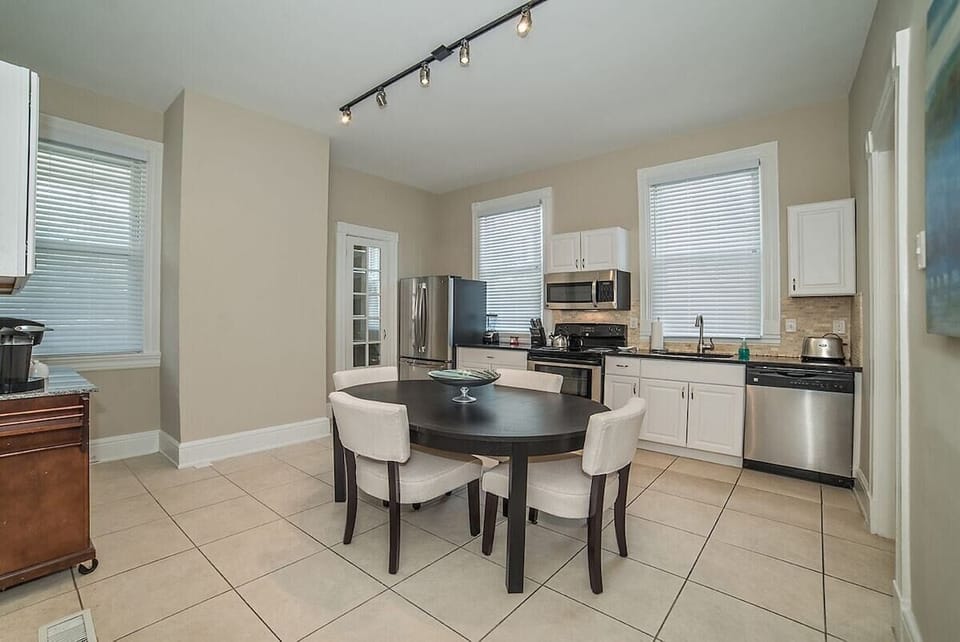 Stainless Kitchen with French Door Refrigerator, Oven, Microwave, and Dishwasher