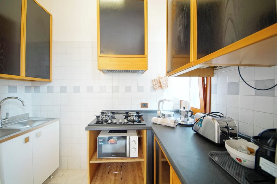 Apartment | Private kitchen | Fridge, microwave, stovetop, electric kettle