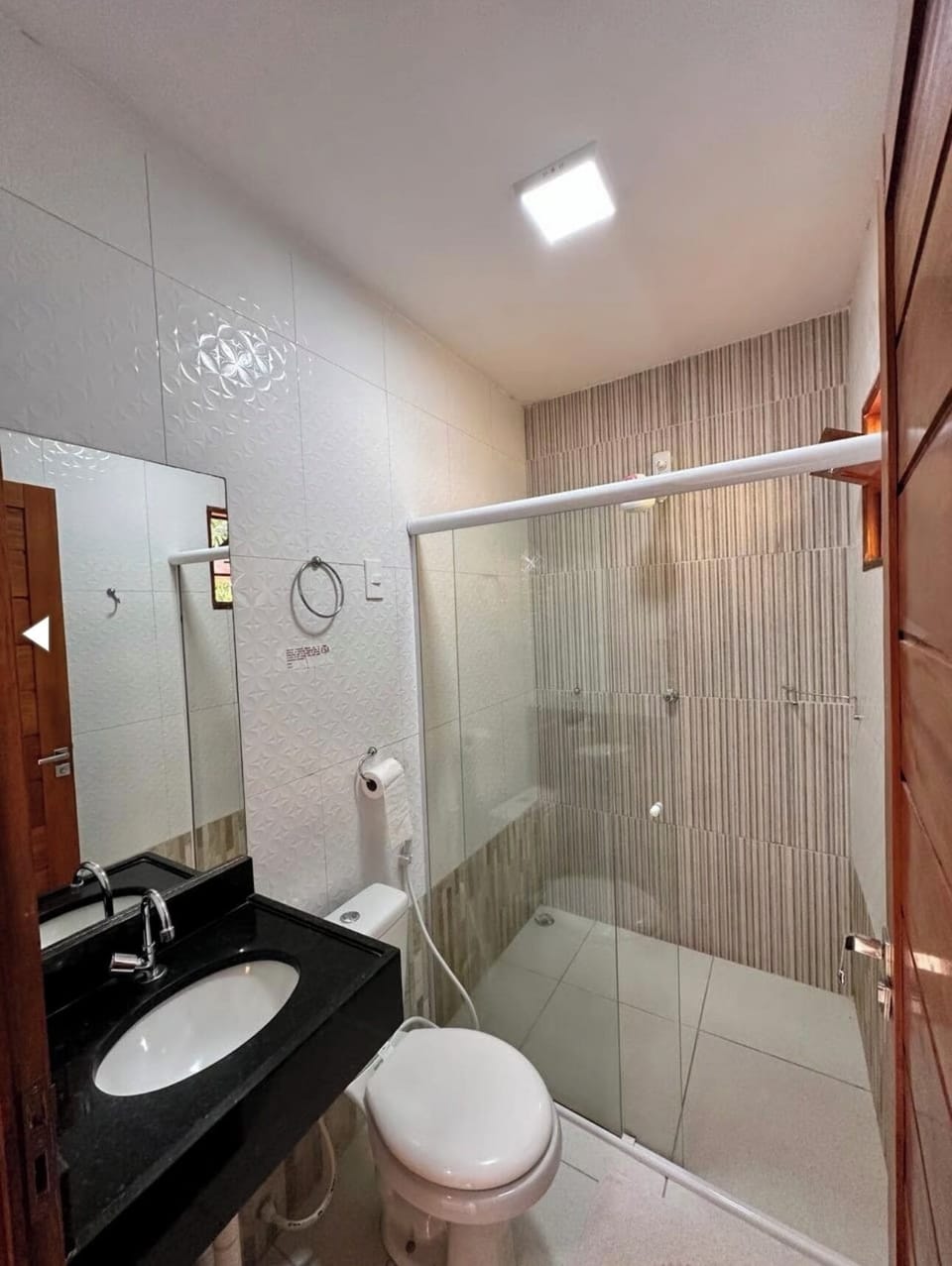 Shower, towels, soap, toilet paper