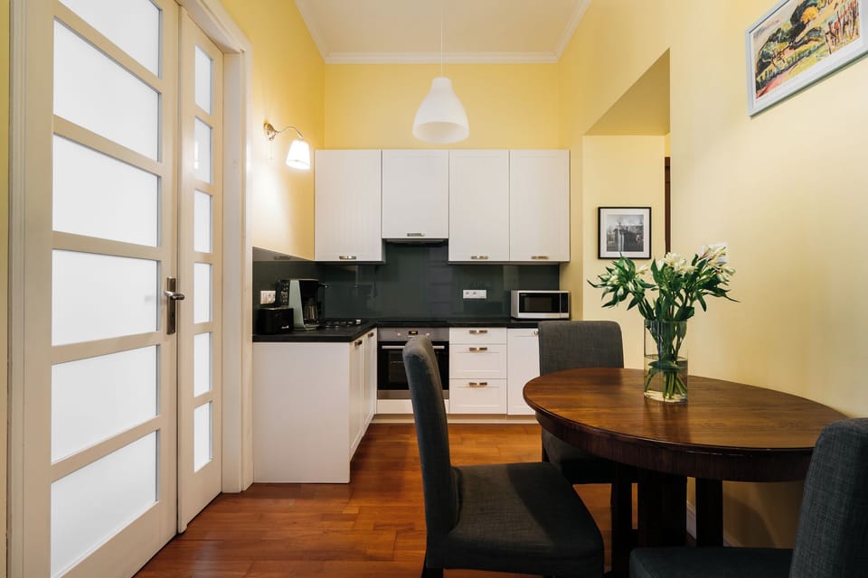 Apartment, City View | Private kitchen | Coffee/tea maker