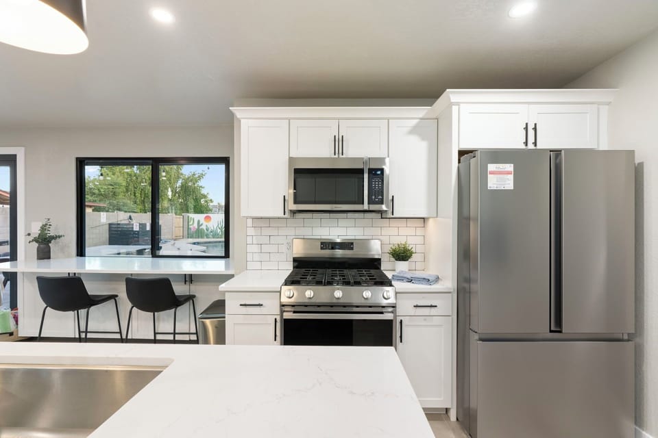 Stylish open kitchen with sleek finishes and cozy vibes